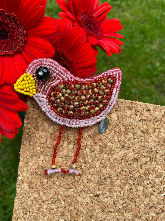 Fly baby bird brooch