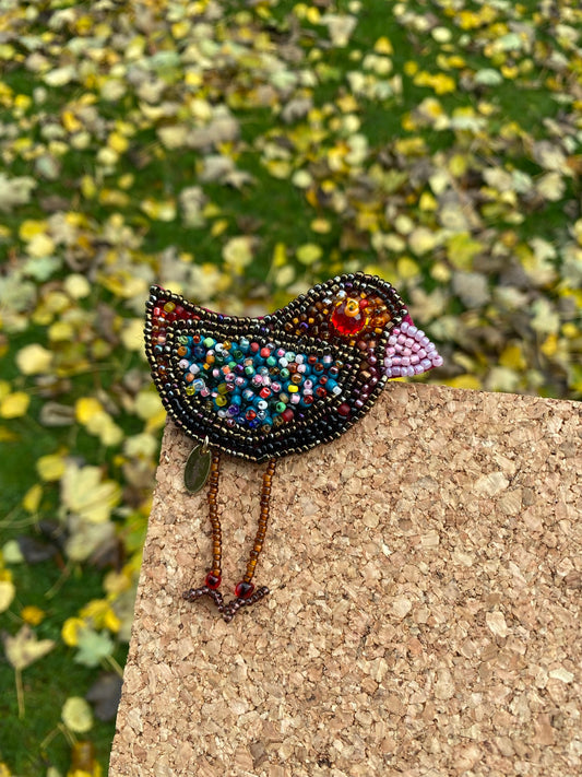 Fly baby bird brooch